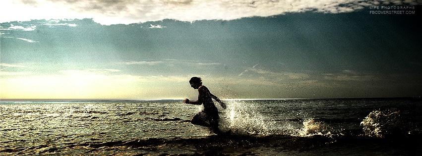 Man Sprinting In Ocean Water Facebook cover